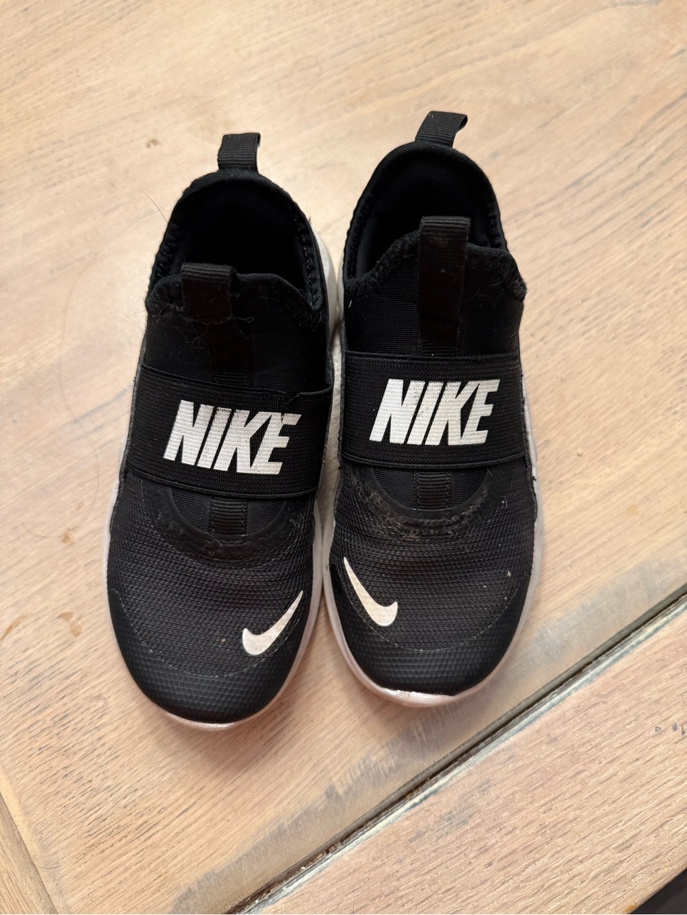 Nike Kids Black and White Slip-On Sneakers
